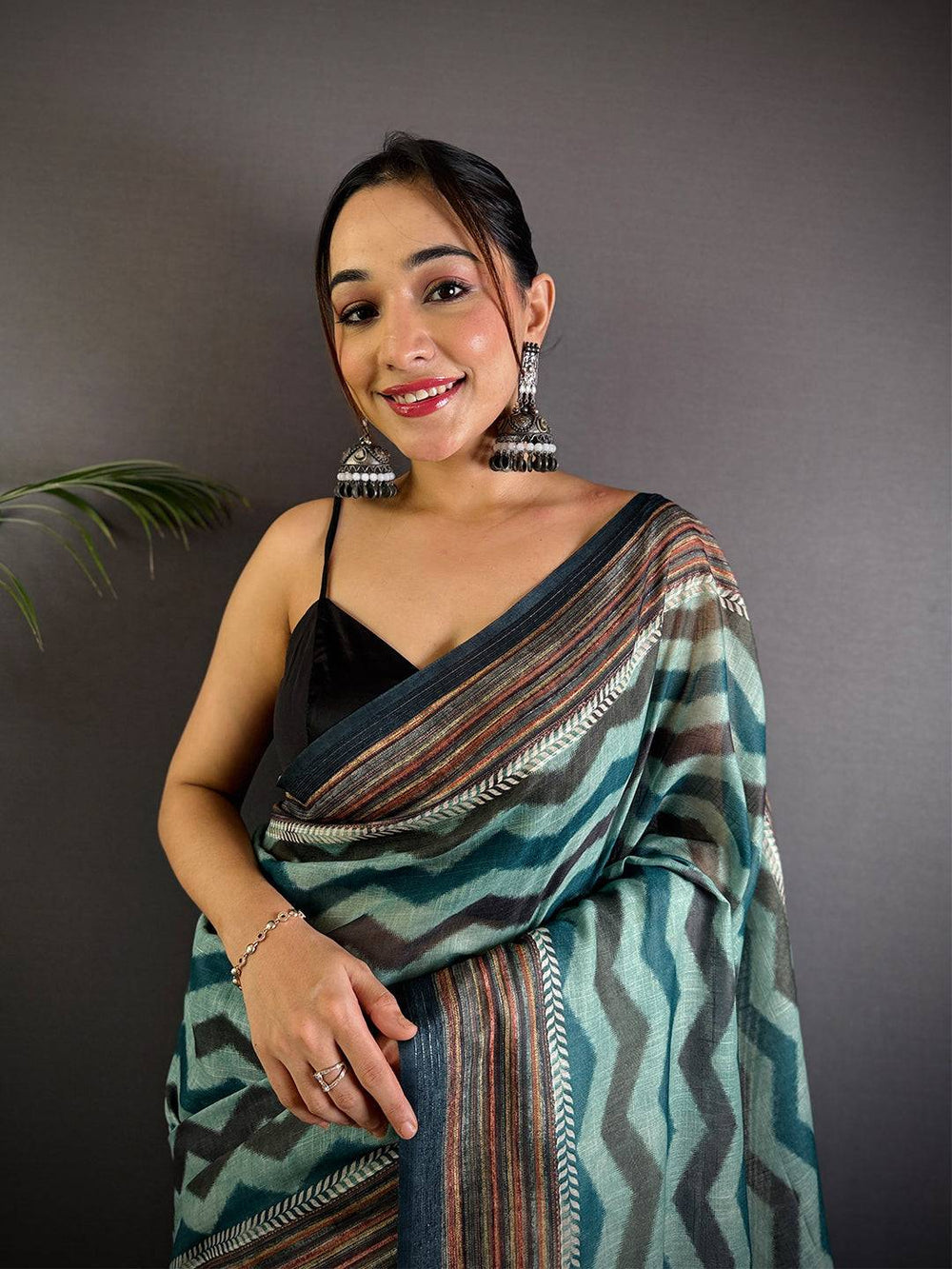 Teal & Black Linen Silk Saree with Chevron Print and Ethnic Border