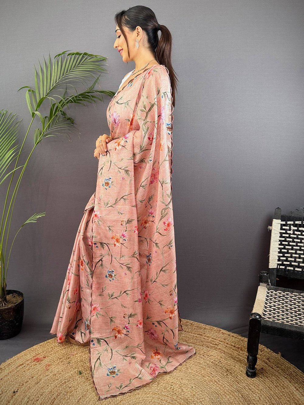 Peach Printed Silk Saree with Soft Floral Design & Elegant Woven Texture