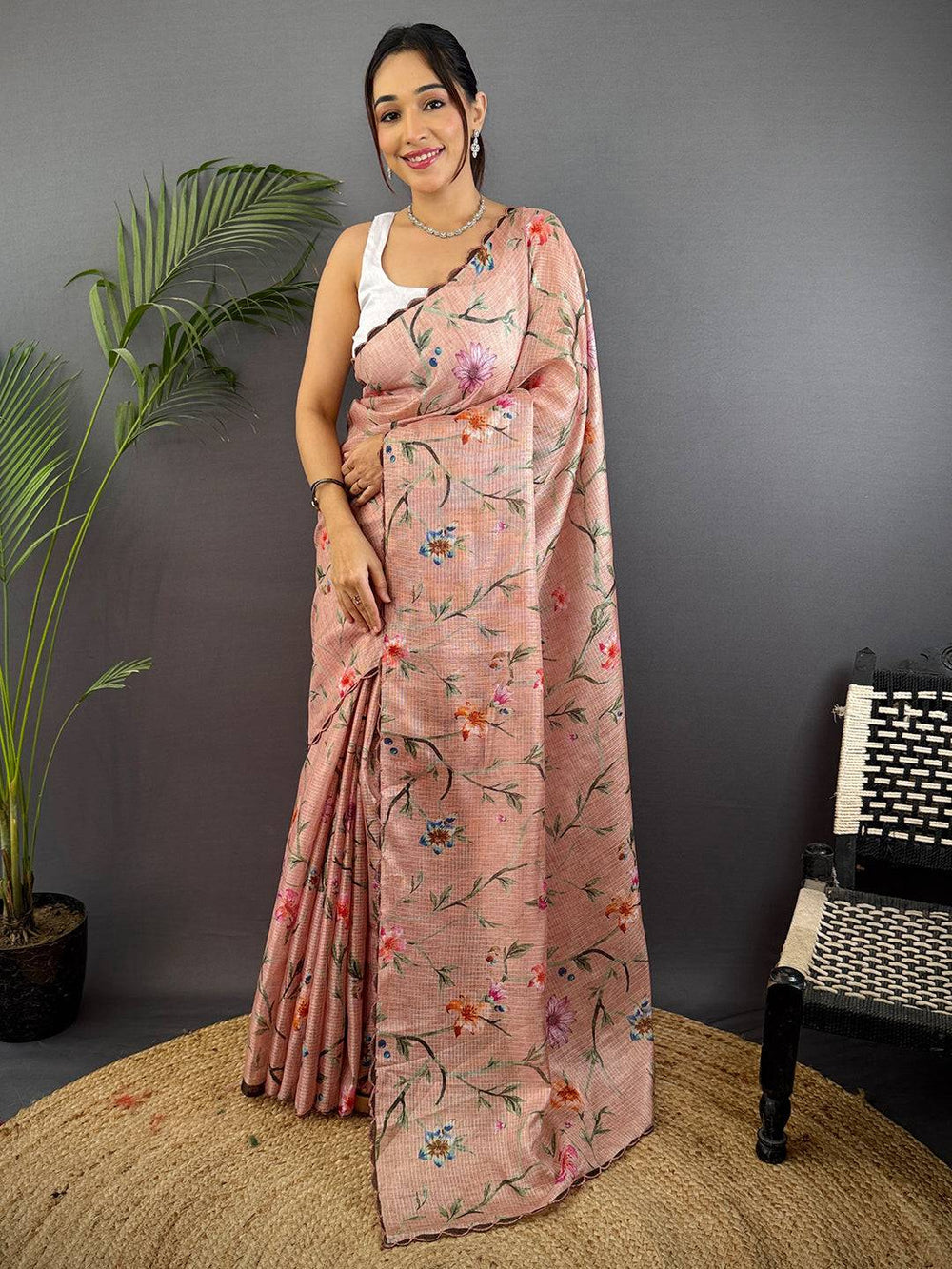 Peach Printed Silk Saree with Soft Floral Design & Elegant Woven Texture