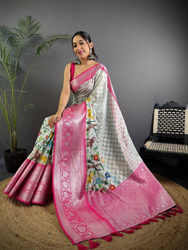 White & Pink Linen Silk Saree with Zari Woven Border and Floral Print