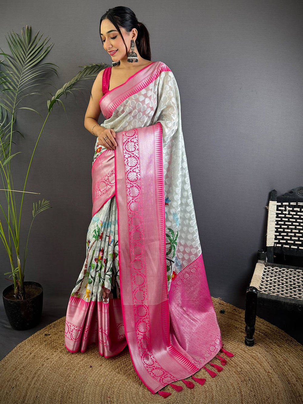 White & Pink Linen Silk Saree with Zari Woven Border and Floral Print