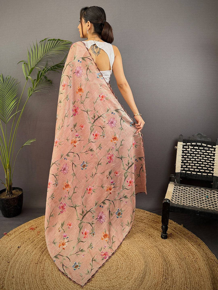Peach Printed Silk Saree with Soft Floral Design & Elegant Woven Texture