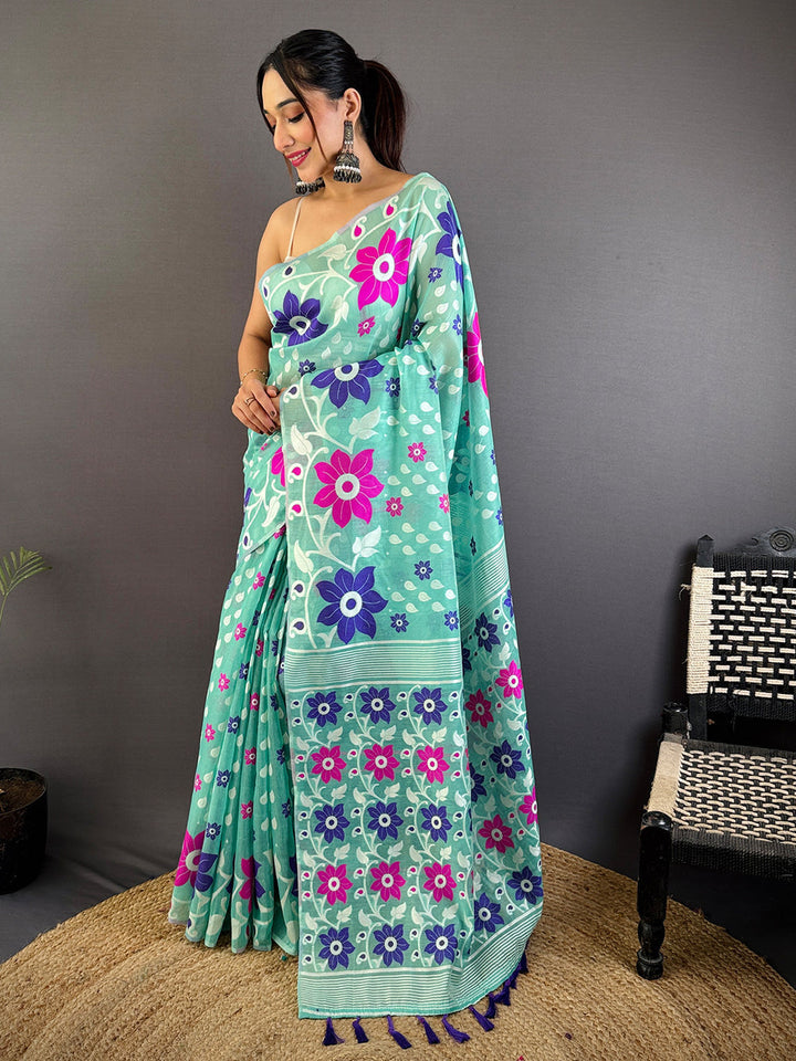 Mint Green Linen Cotton Saree with Bold Floral Print & Contrast Tassel Pallu