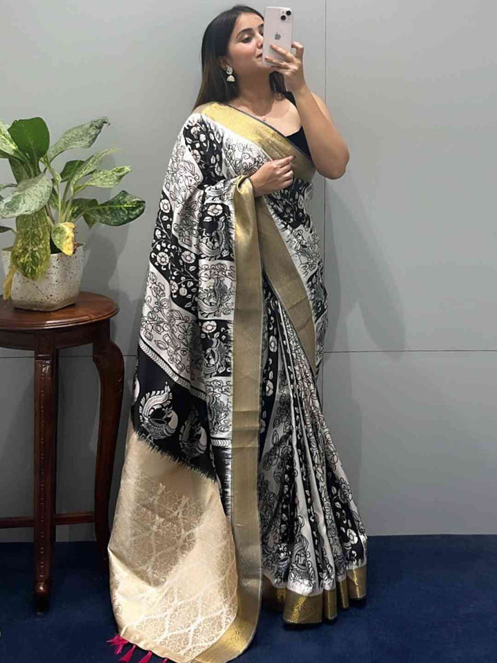 Black & Cream Linen Silk Saree with Artistic Madhubani Print & Golden Zari Borde