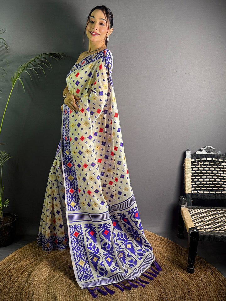 Cream Linen Cotton Saree with Multicolor Tribal Print & Indigo Border