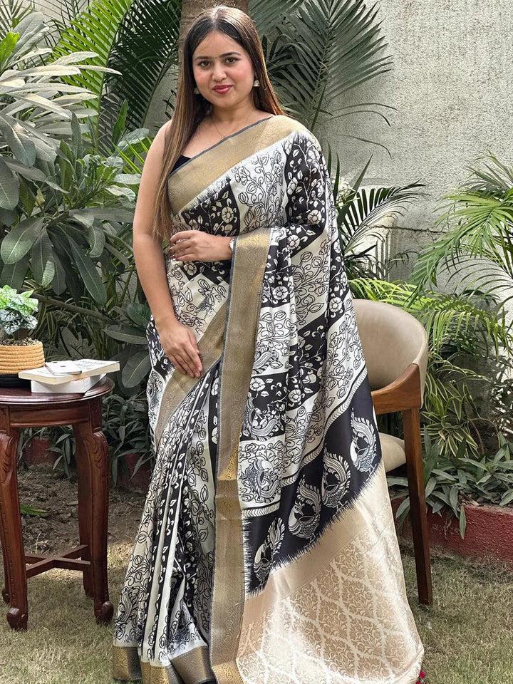 Black & Cream Linen Silk Saree with Artistic Madhubani Print & Golden Zari Borde