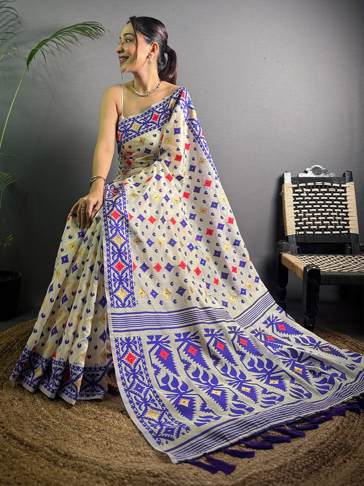 Cream Linen Cotton Saree with Multicolor Tribal Print & Indigo Border