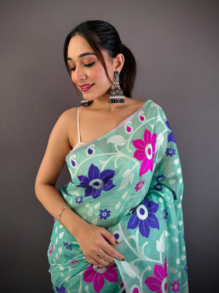 Mint Green Linen Cotton Saree with Bold Floral Print & Contrast Tassel Pallu