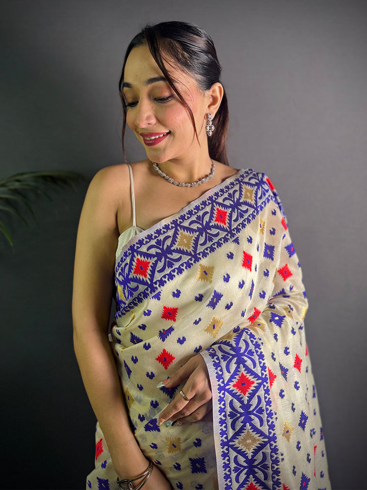 Cream Linen Cotton Saree with Multicolor Tribal Print & Indigo Border
