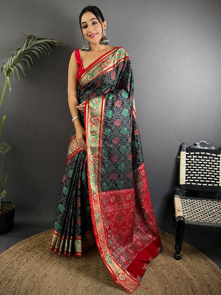 Black Patola Print Linen Silk Saree with Red & Green Zari Border