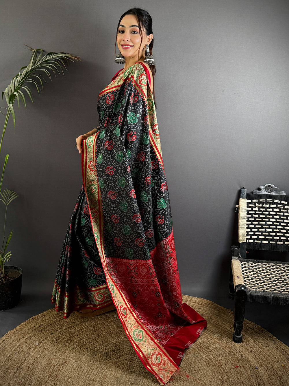 Black Patola Print Linen Silk Saree with Red & Green Zari Border