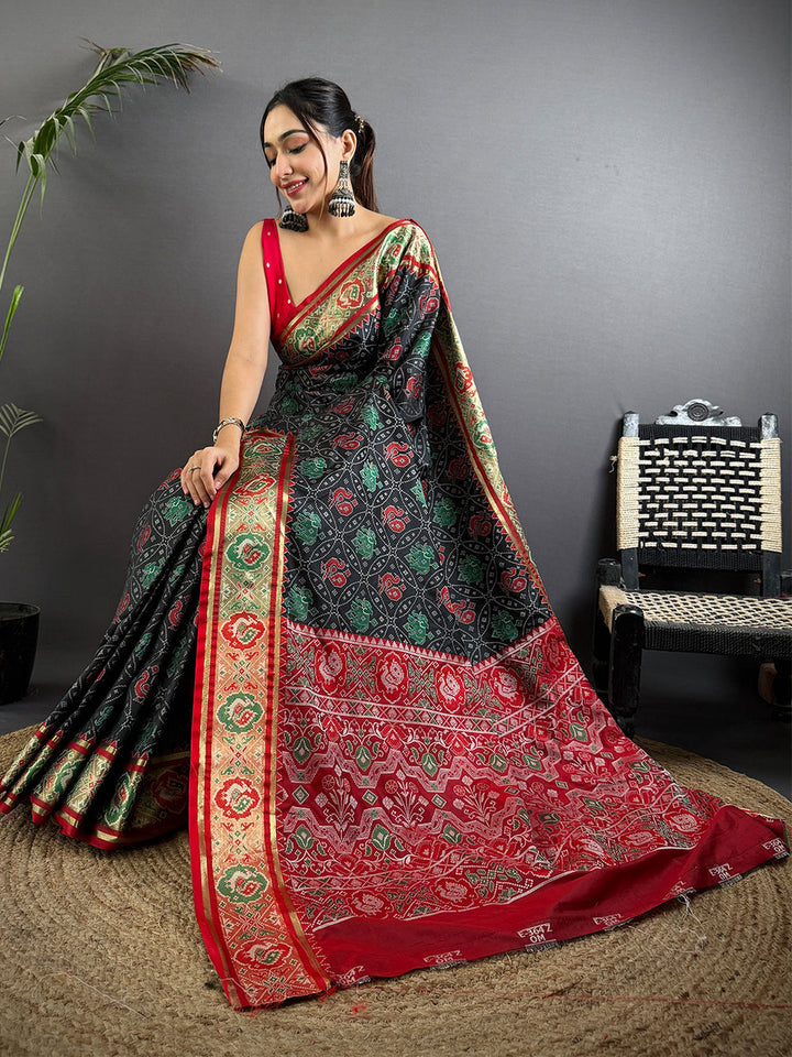 Black Patola Print Linen Silk Saree with Red & Green Zari Border