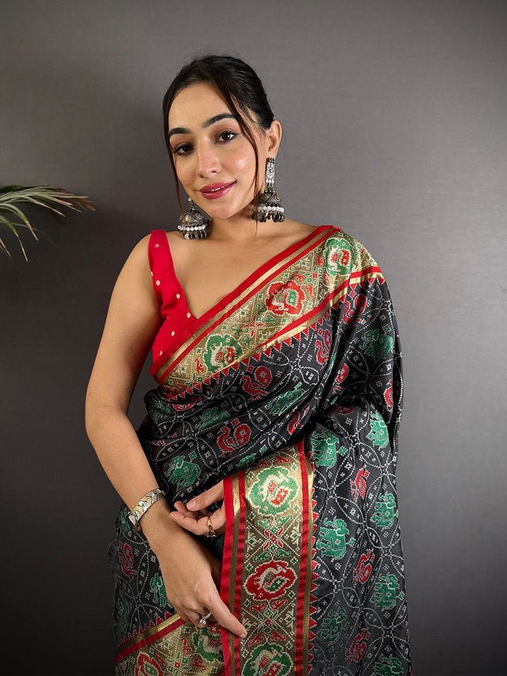Black Patola Print Linen Silk Saree with Red & Green Zari Border