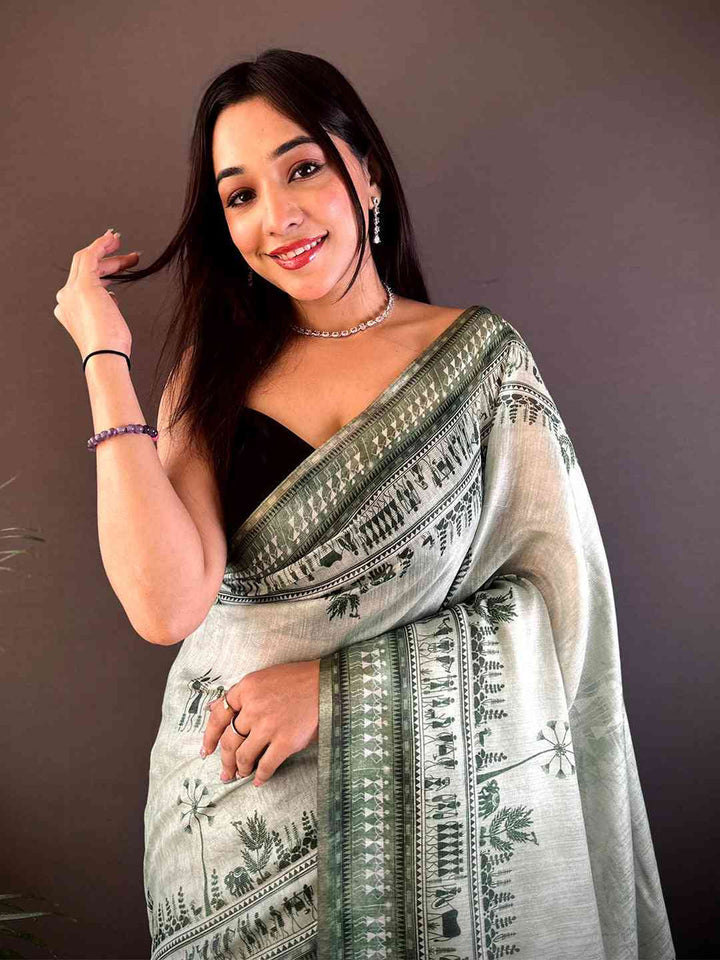 Green Tribal Print Linen Saree with Ethnic Border & Tassels