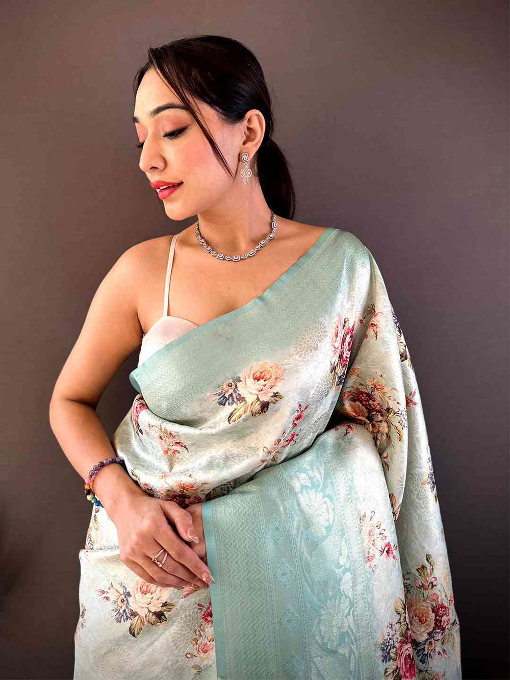 Mint Green Floral Banarasi Silk Saree with Woven Pallu & Tassels