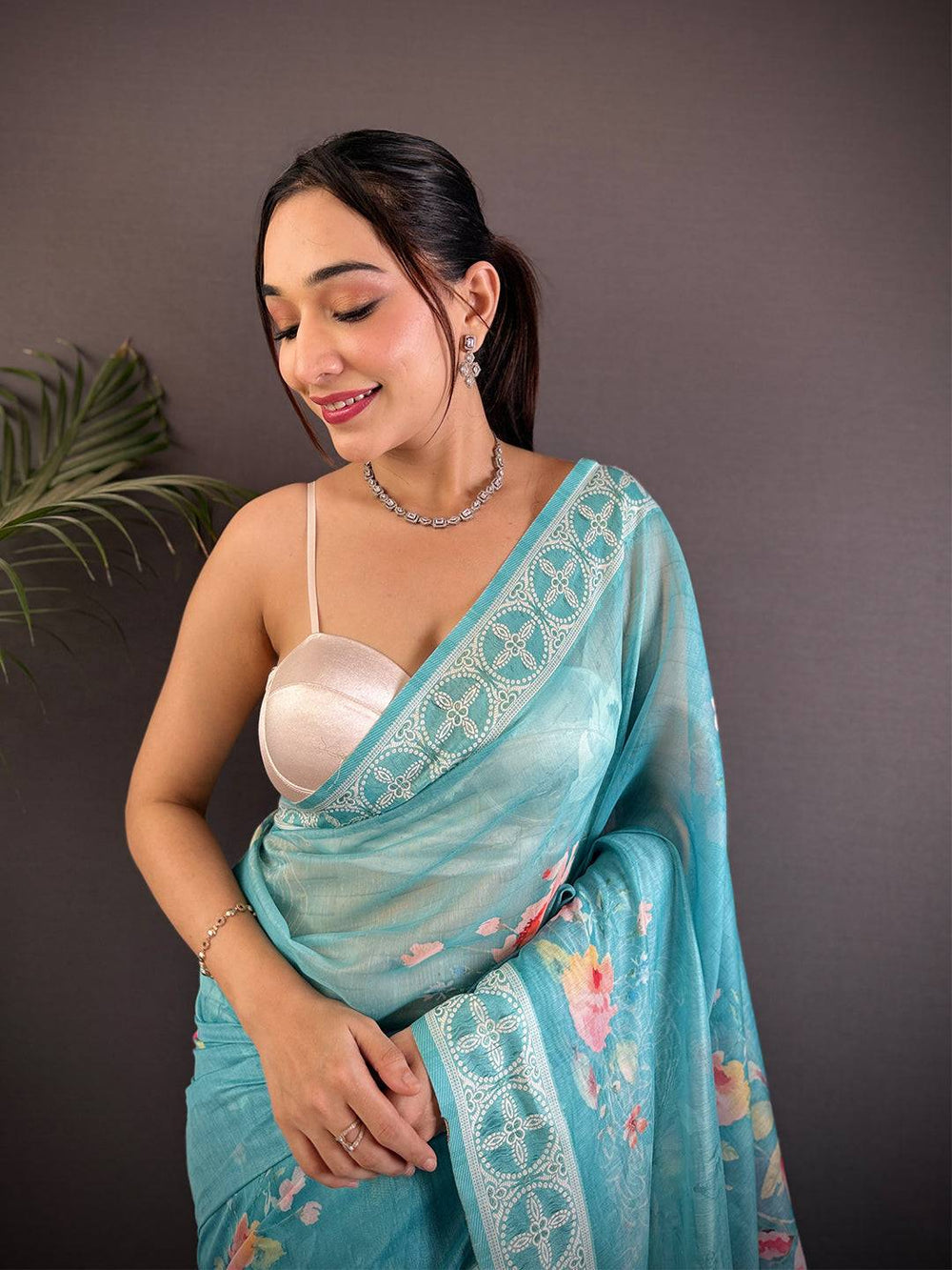 Sky Blue Linen Silk Saree with Floral Print & Embroidered Style Border
