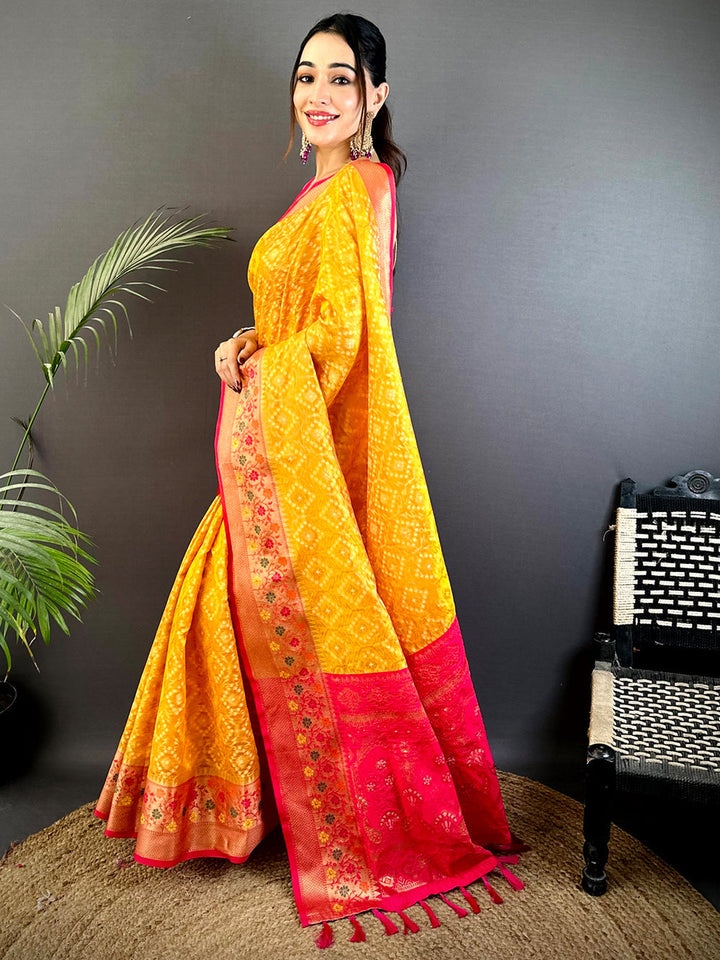 Yellow Banarasi Silk Saree with Pink Contrast Border & Rich Zari Weaving