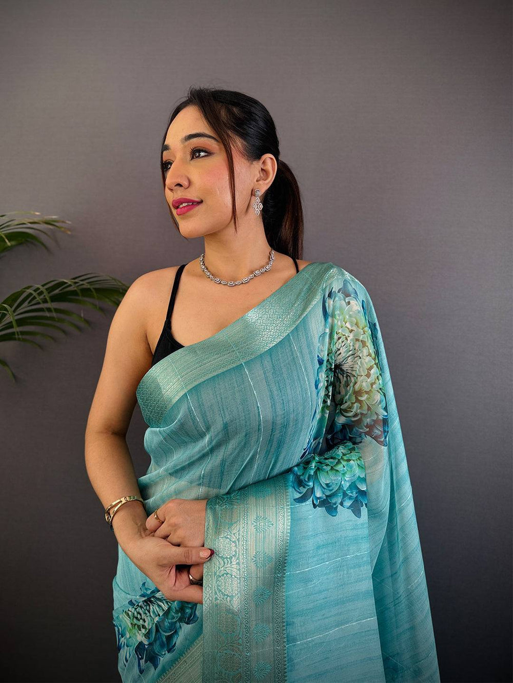 Turquoise Linen Silk Saree with Big Floral Print & Zari Border