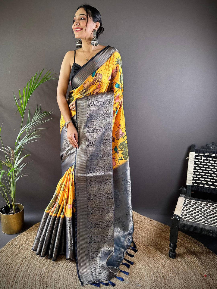 Yellow Madhubani Printed Soft Silk Saree with Grey Zari Border & Tassel Pallu