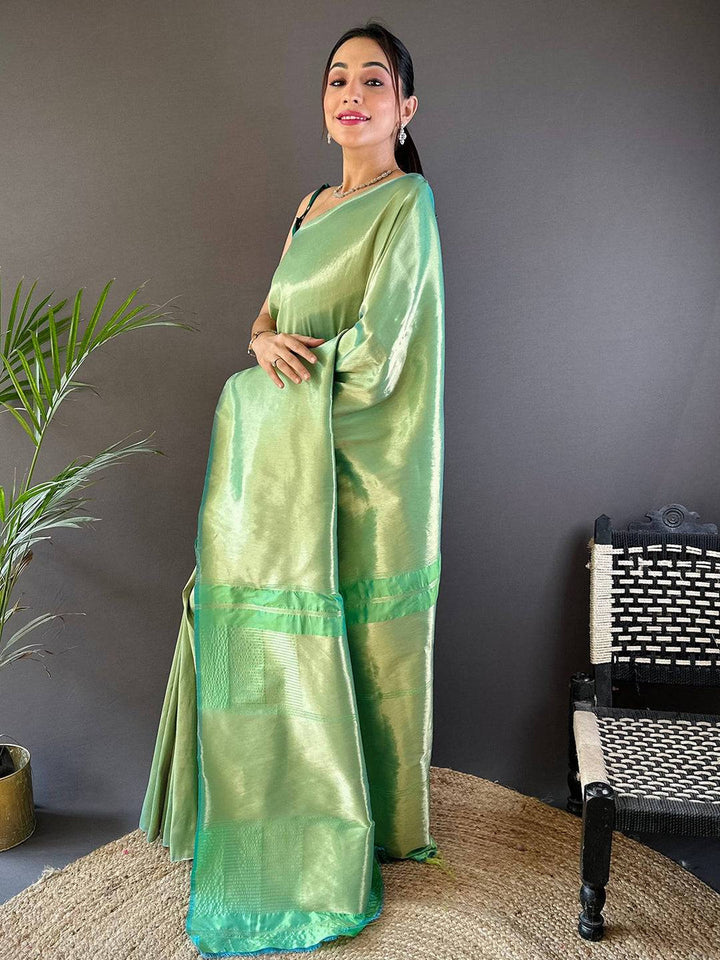 Pastel Green Soft Silk Saree with Glossy Finish & Contrast Border