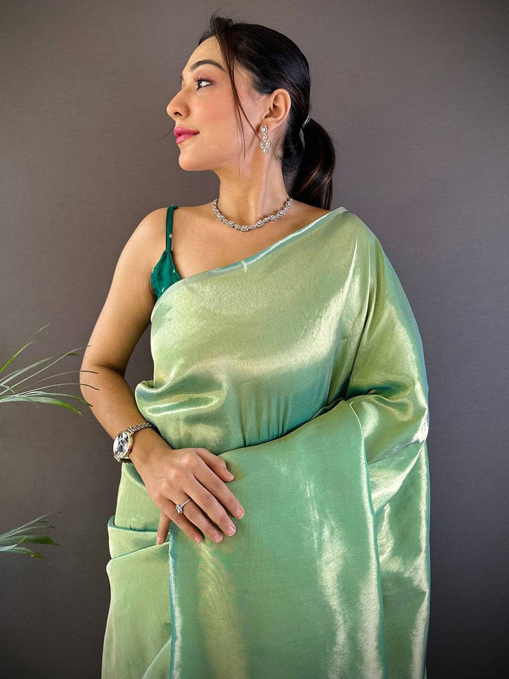 Pastel Green Soft Silk Saree with Glossy Finish & Contrast Border