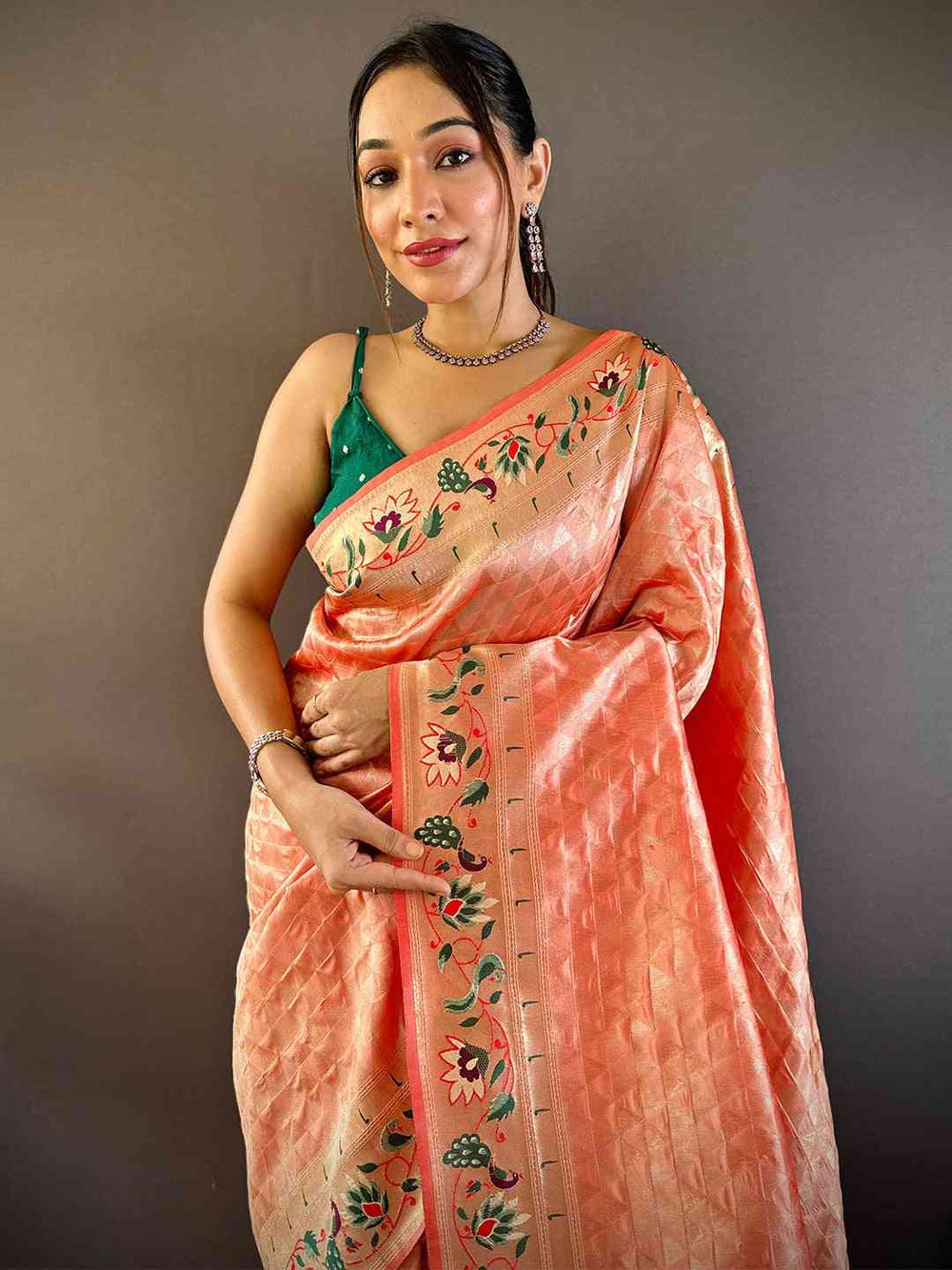 Elegant Peach Kanchipuram Silk Saree with Embroidered Floral Border & Tassels