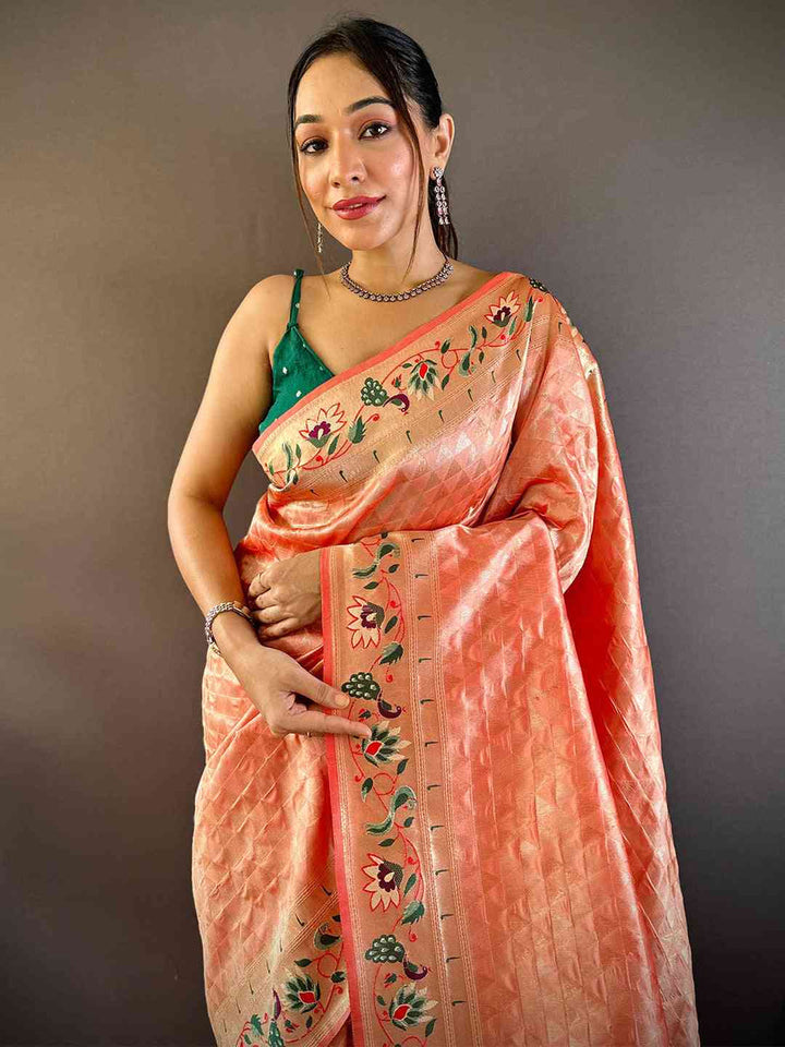 Elegant Peach Kanchipuram Silk Saree with Embroidered Floral Border & Tassels