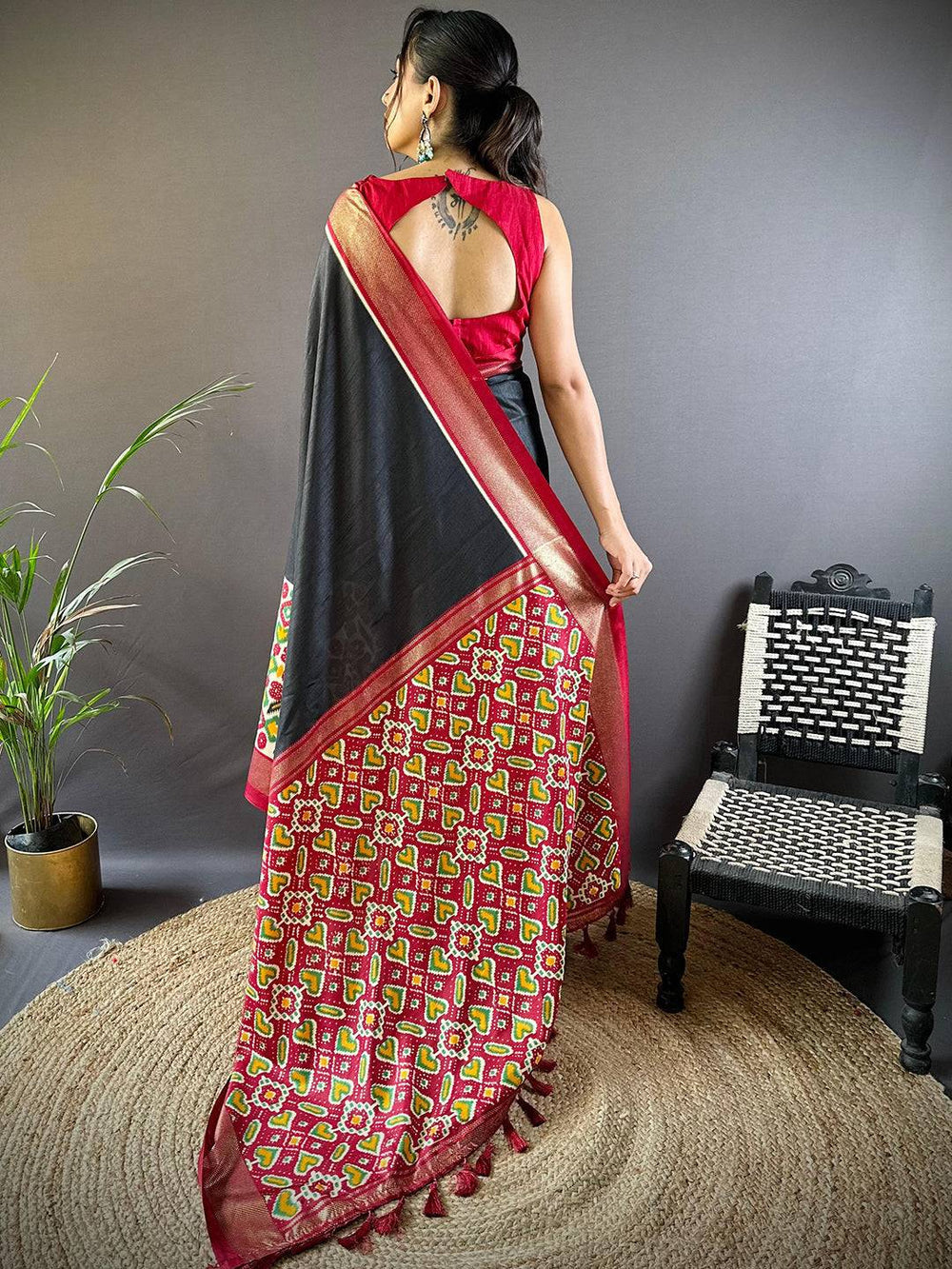 Black Patola Banarasi Silk Saree with Multicolor Weaving & Red Border