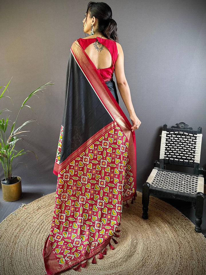 Black Patola Banarasi Silk Saree with Multicolor Weaving & Red Border