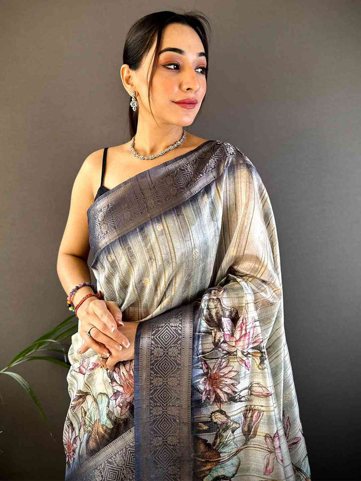 Grey Soft Silk Saree with Floral Print & Rich Zari Border