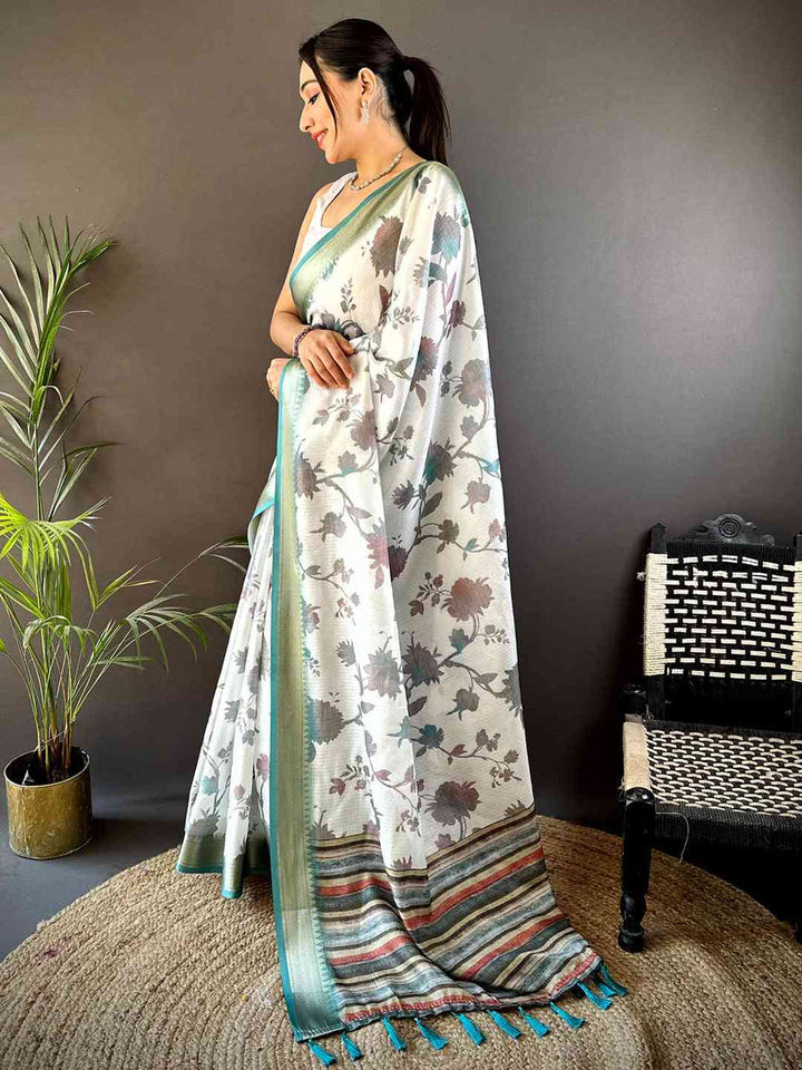 White Linen Silk Saree with Subtle Floral Print & Teal Striped Border
