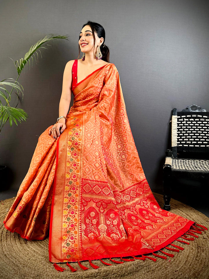 Orange & Red Banarasi Silk Saree with Intricate Zari Weaving and Floral Border