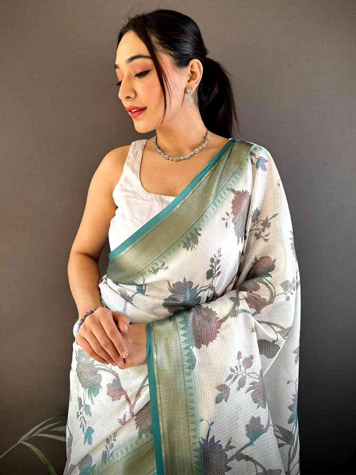White Linen Silk Saree with Subtle Floral Print & Teal Striped Border