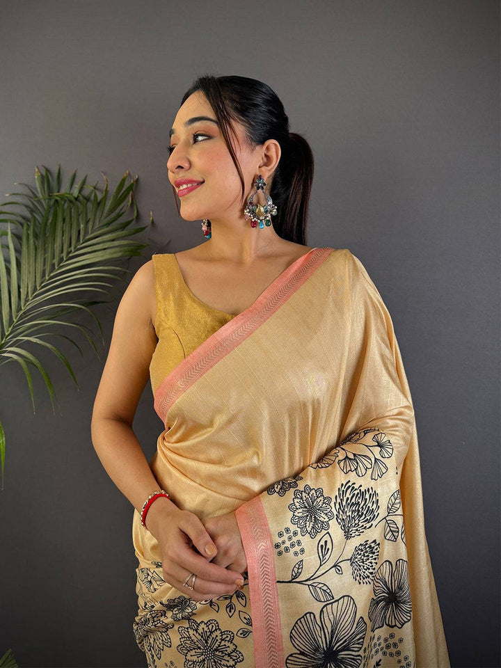 Cream Soft Silk Saree with Black Floral Digital Print and Peach Woven Border