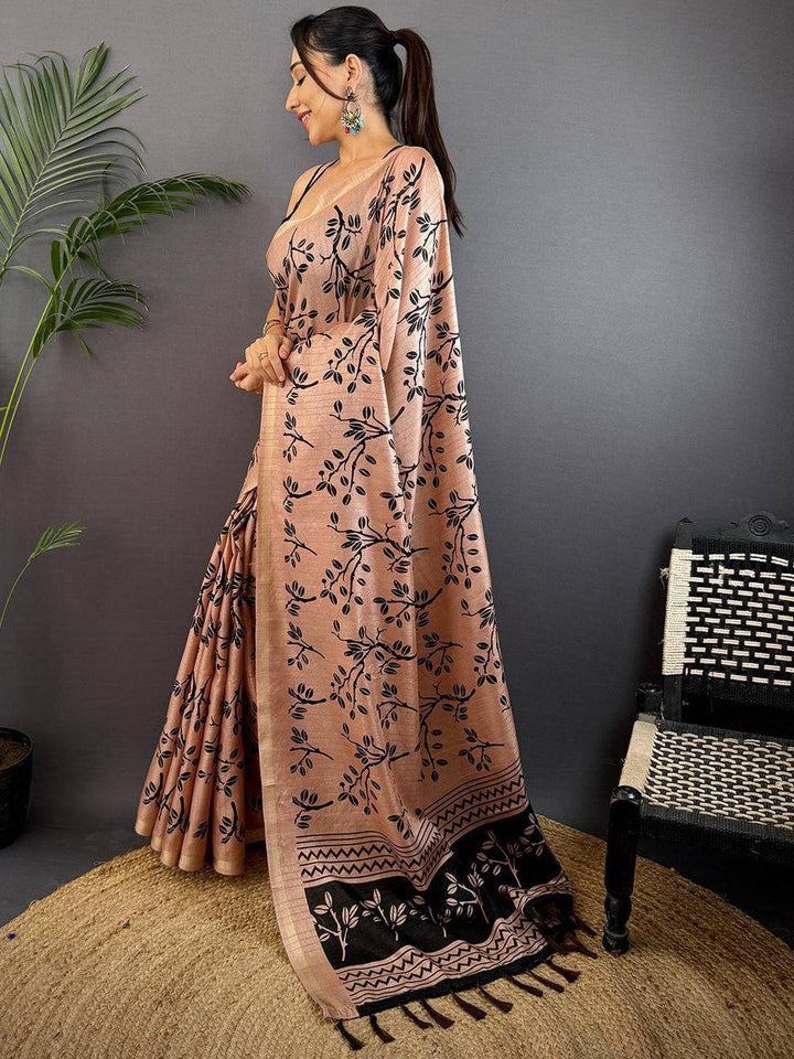 Peach Linen Saree with Black Leaf Print & Woven Border