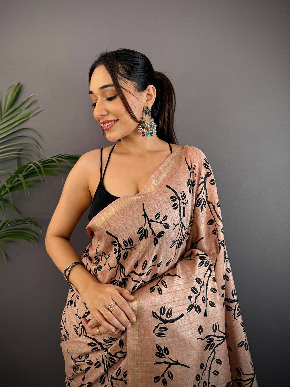 Peach Linen Saree with Black Leaf Print & Woven Border
