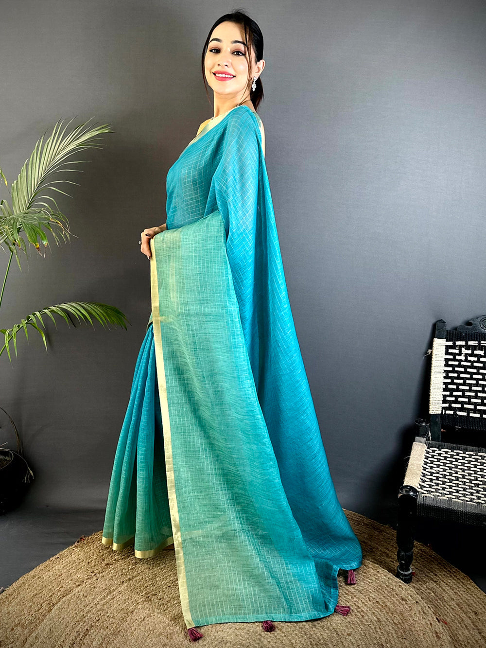 Teal Handwoven Linen Saree with Golden Border & Tassel Pallu