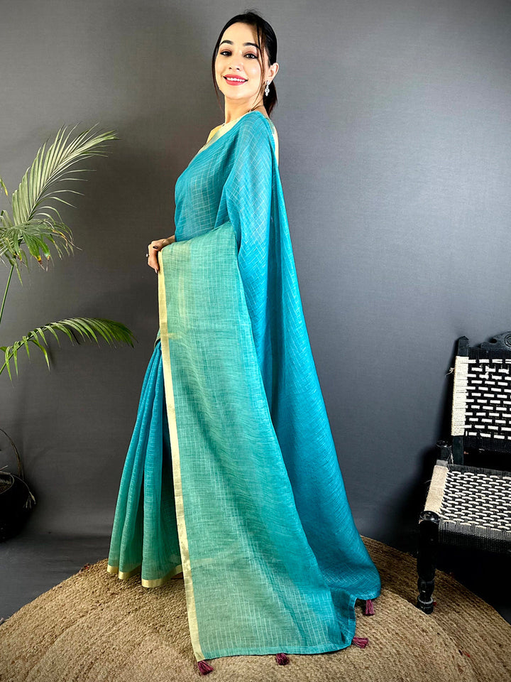 Teal Handwoven Linen Saree with Golden Border & Tassel Pallu