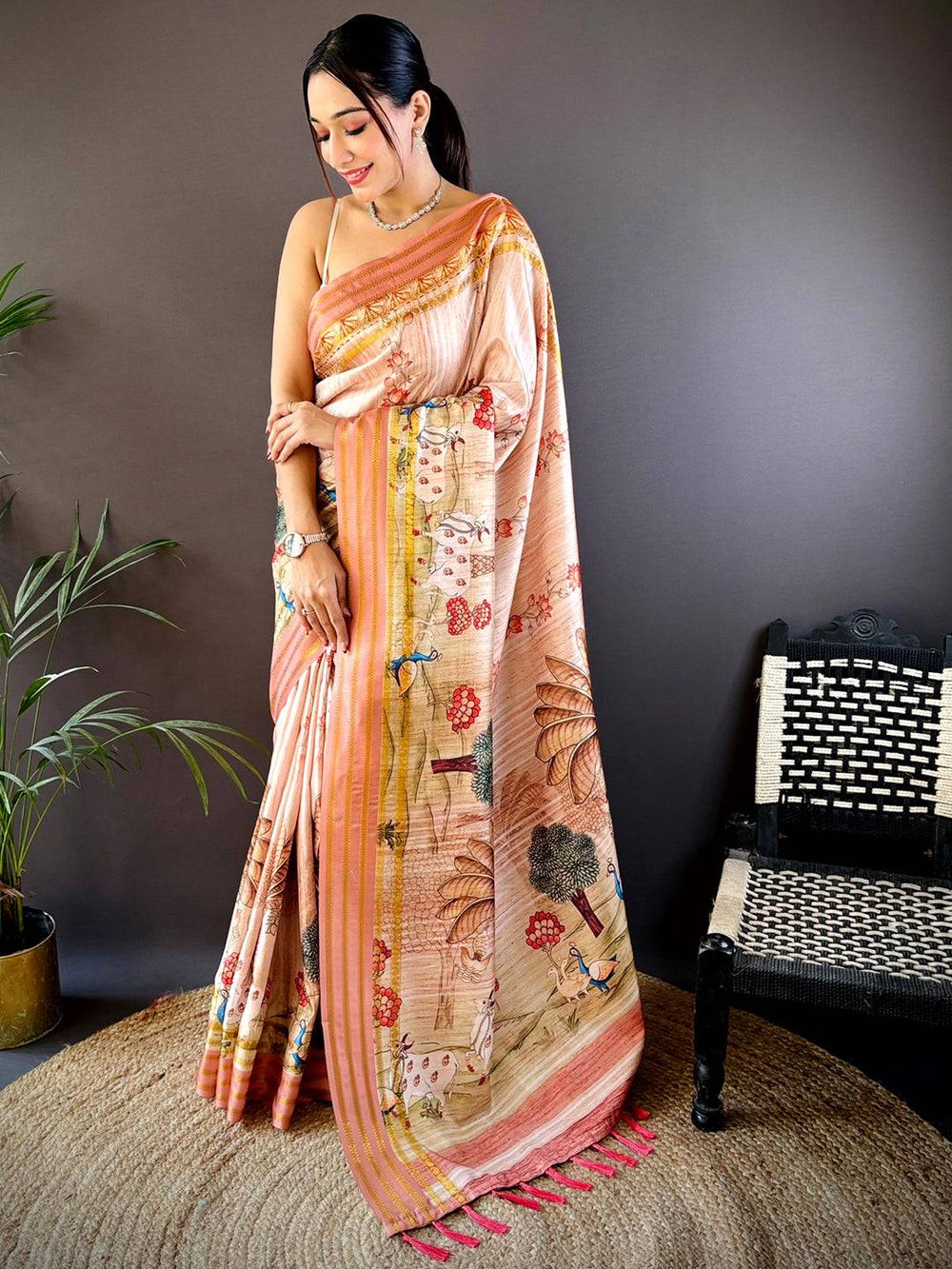 Peach Art Silk Saree with Village Theme Print & Contrast Tassel Pallu