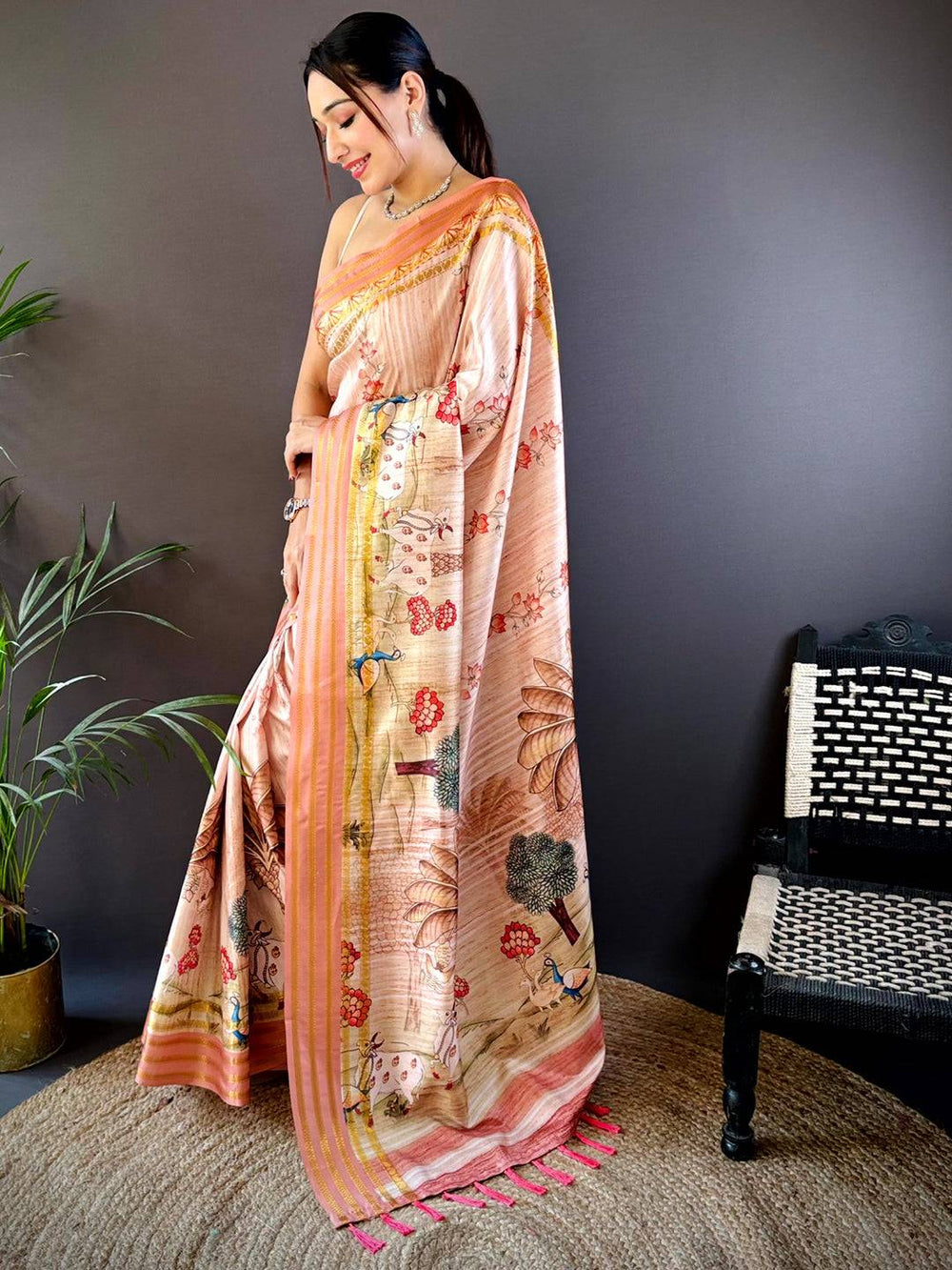 Peach Art Silk Saree with Village Theme Print & Contrast Tassel Pallu