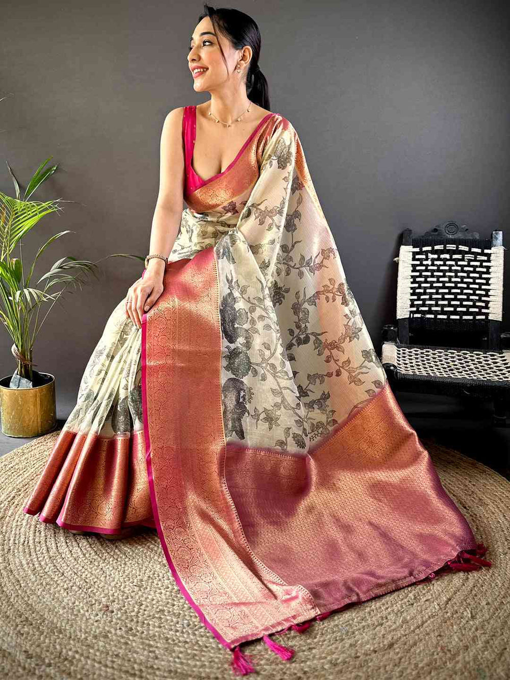 Peach & Cream Floral Printed Silk Saree with Zari Border and Tassels