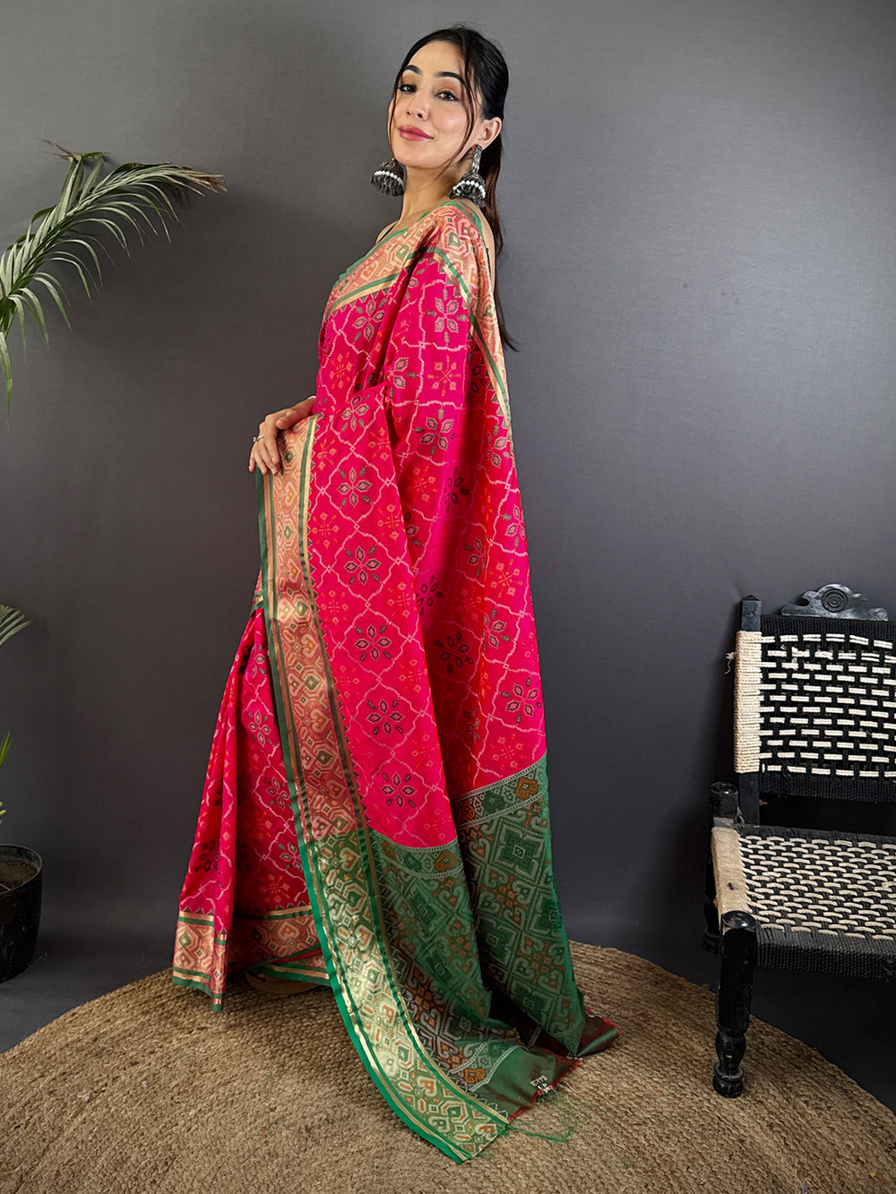Rani Pink Patola Banarasi Silk Saree with Green Contrast Border & Zari Weaving