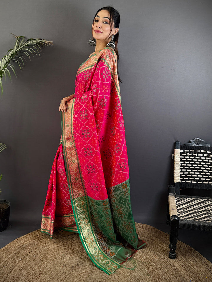 Rani Pink Patola Banarasi Silk Saree with Green Contrast Border & Zari Weaving