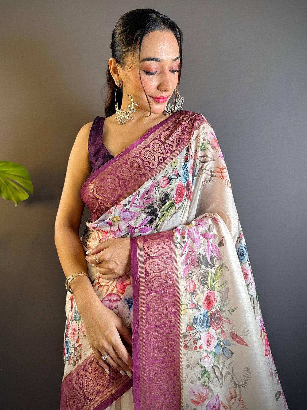 Cream & Wine Floral Banarasi Silk Saree with Zari Border & Tassels