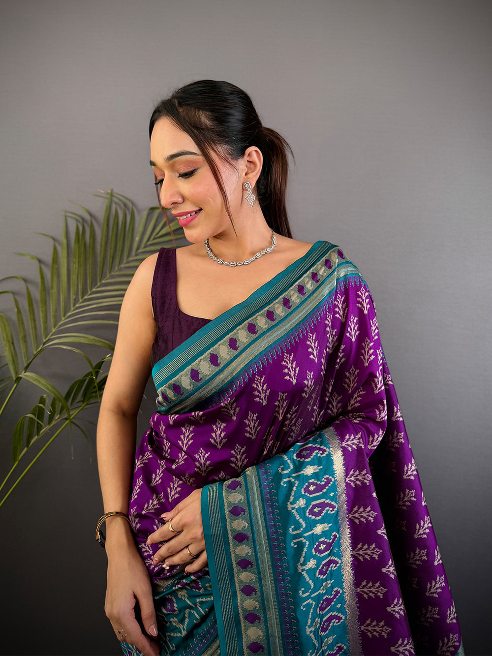Purple & Teal Patola Print Silk Saree with Zari Border and Tassel Pallu