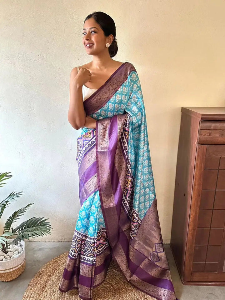 Aqua Blue Ikat Print Soft Silk Saree with Purple Zari Border & Designer Pallu