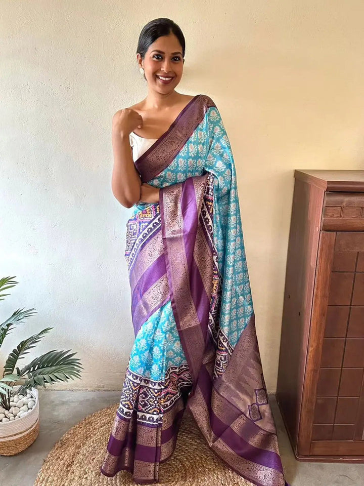 Aqua Blue Ikat Print Soft Silk Saree with Purple Zari Border & Designer Pallu