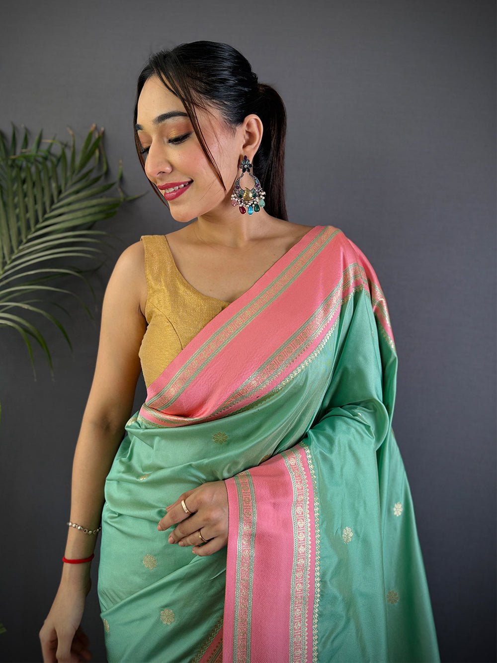 Mint Green Soft Silk Saree with Peach Pink Zari Border & Tassels