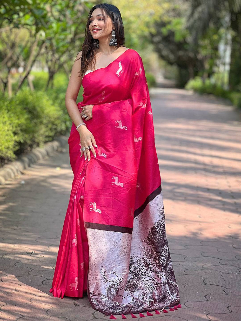 Pink Printed Silk Saree with Deer Motifs & Artistic Forest Themed Pallu