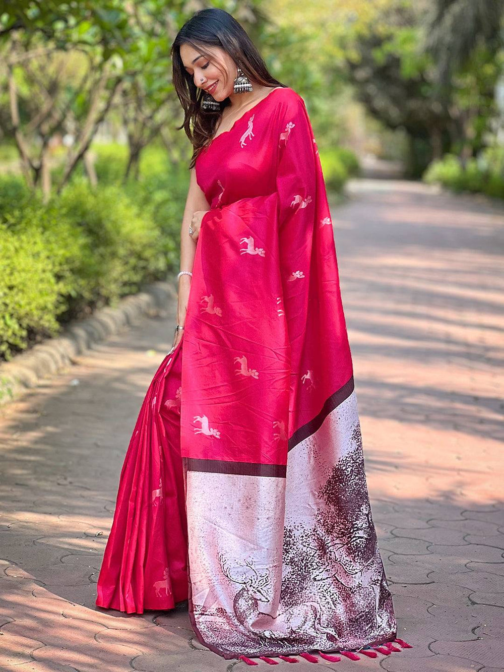 Pink Printed Silk Saree with Deer Motifs & Artistic Forest Themed Pallu
